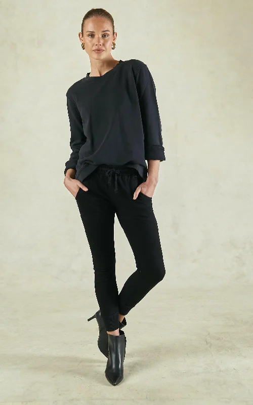 Timeless clothing pieces every woman should own   Active Black Cuffed Jeans